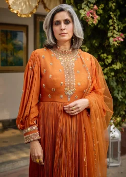 Rust Crepe Anarkali Suit With Pleated Sleeves And Net Dupatta