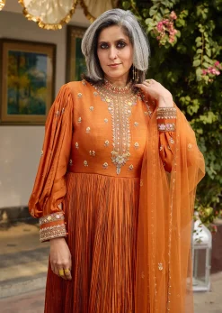 Rust Crepe Anarkali Suit With Pleated Sleeves And Net Dupatta