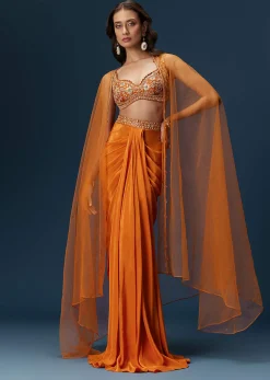 Rust Dhoti Skirt Set With Embellished Blouse And Tassel Net Dupatta