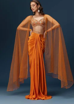 Rust Dhoti Skirt Set With Embellished Blouse And Tassel Net Dupatta