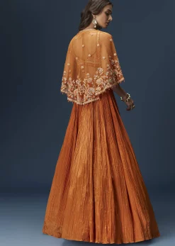 Rust Orange Embroidered Lehenga With Dramatic Cape And Blouse