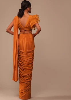 Rust Orange Pre Drape Saree With Fancy Ruffle Blouse And Embroidered Belt