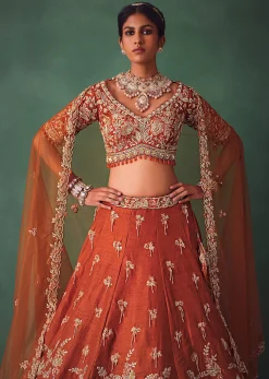 Rust Raw Silk Bridal Kali Lehenga With Embroidered Blouse And Dupatta