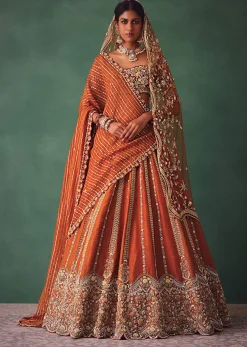 Rust Raw Silk Bridal Lehenga With Buti Work Dupatta
