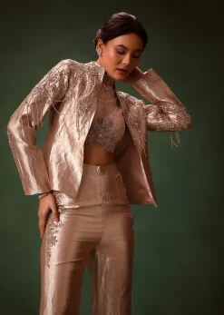 Rust Stretch Net Bell Bottom Set With Embroidered Blazer And Polo Neck Top