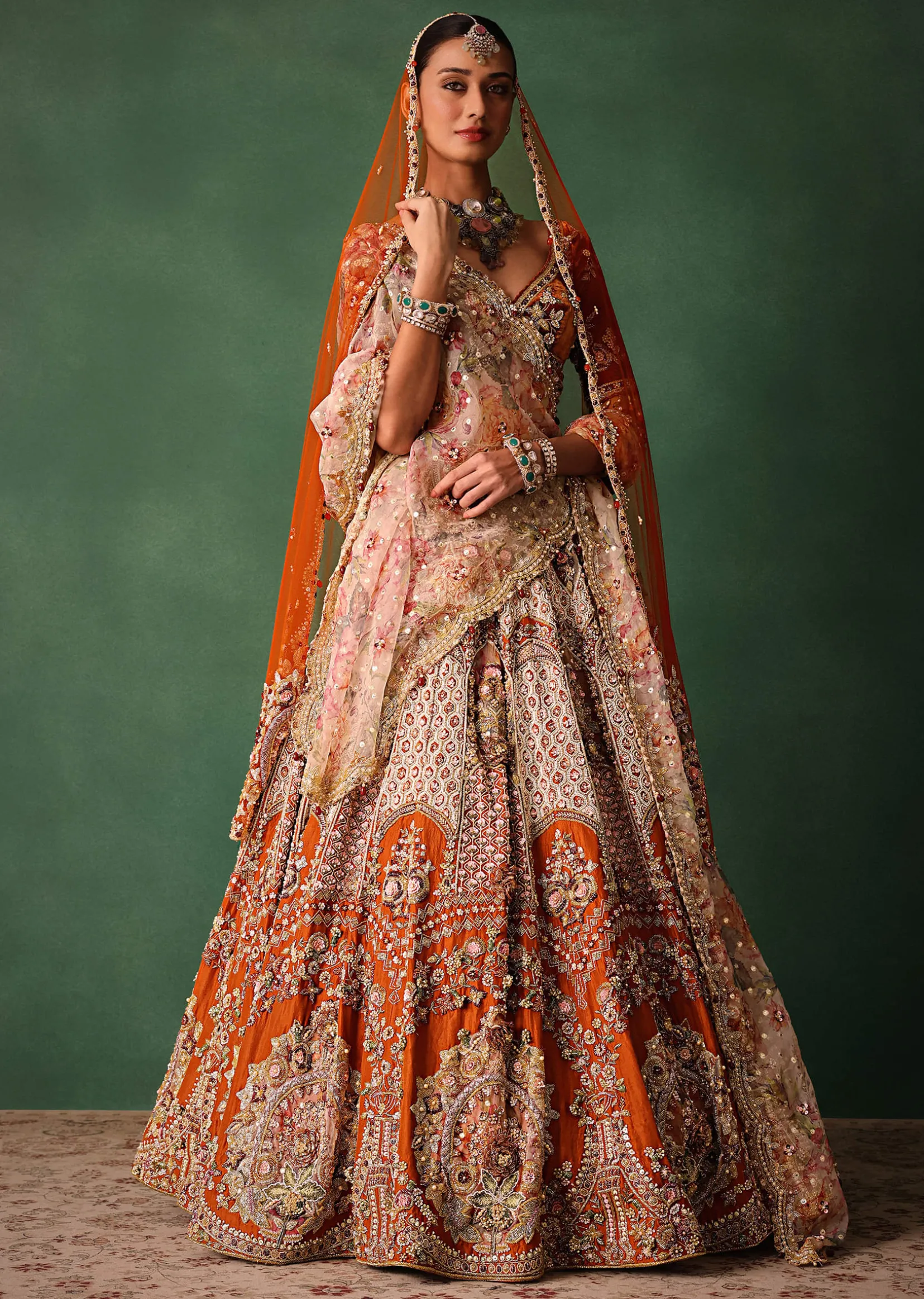 Rust V Neck Blouse With Heavy Jaal Cutdana Work Bridal Lehenga And Heavy Dupatta
