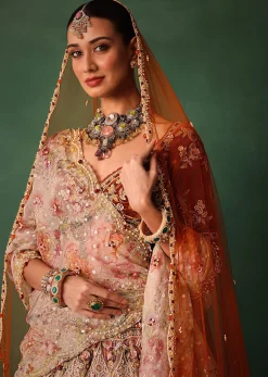 Rust V Neck Blouse With Heavy Jaal Cutdana Work Bridal Lehenga And Heavy Dupatta