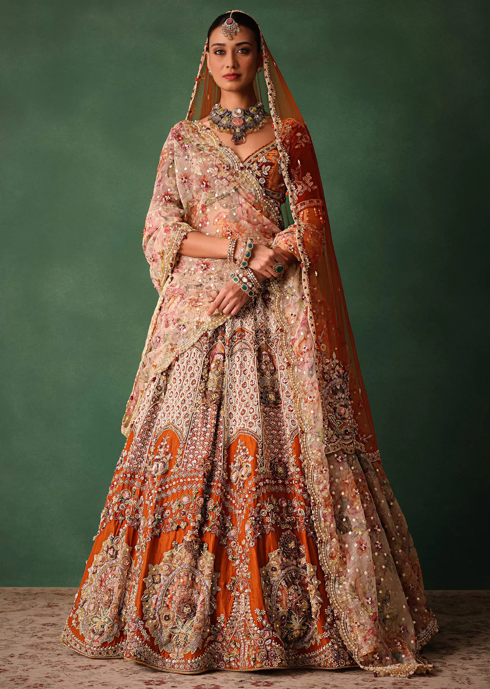 Rust V Neck Blouse With Heavy Jaal Cutdana Work Bridal Lehenga And Heavy Dupatta