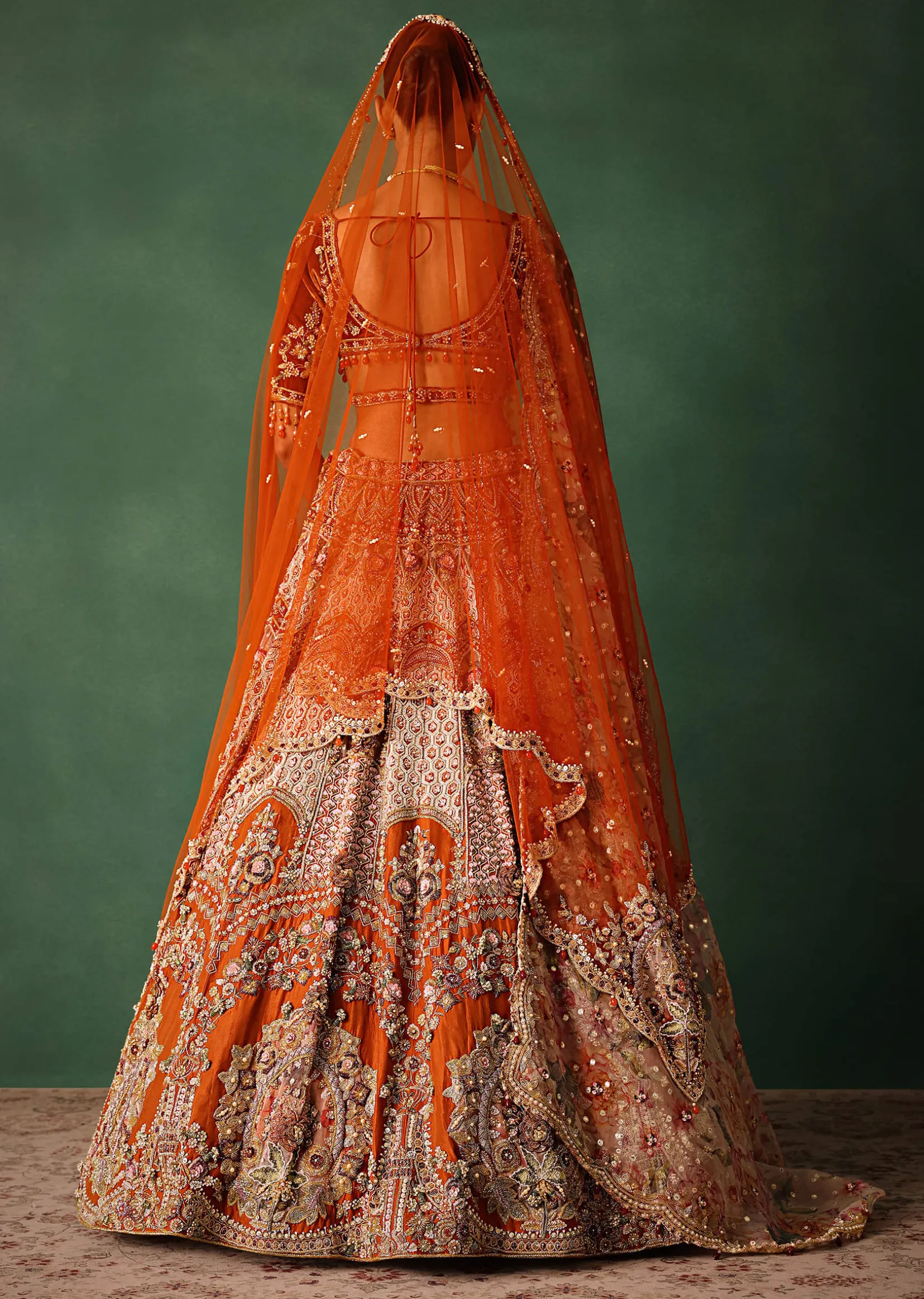 Rust V Neck Blouse With Heavy Jaal Cutdana Work Bridal Lehenga And Heavy Dupatta