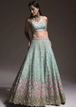 Sage Green Lehenga Choli In Raw Silk With Vibrant Resham Embroidered Cluster Of Summer Blooms And Buttis