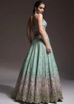 Sage Green Lehenga Choli In Raw Silk With Vibrant Resham Embroidered Cluster Of Summer Blooms And Buttis