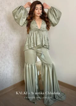 Sage Green Sharara Suit In Satin With A Peplum Top Featuring Plunging Neckline And Balloon Sleeves