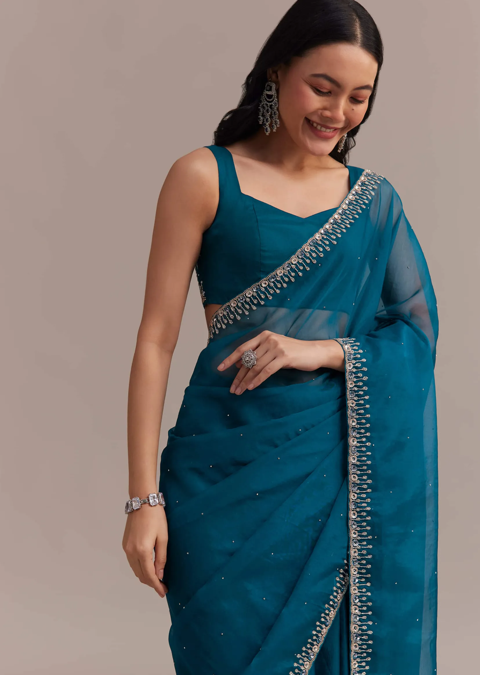 Sapphire Blue Organza Saree With Sequins And Cutdana Embellished Border