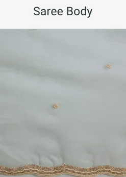 Sea Green Crush Tissue Saree With Stone And Moti Embroidery And Scallop Border