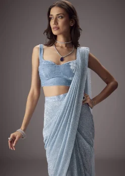 Sky Blue Shimmer Saree Paired With A Sweetheart Velvet Blouse