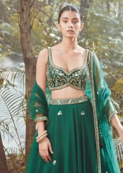 Srushti Porey In Kalki Pine Green Lehenga Choli In Raw Silk With Butti Work And Heavy Hand Embroidery In Mughal Motifs On The Choli