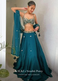 Srushti Porey In Kalki Pine Green Lehenga Choli In Raw Silk With Butti Work And Heavy Hand Embroidery In Mughal Motifs On The Choli