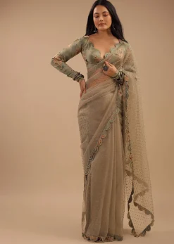Tea Green Organza Saree With Self Buttis And A Floral Printed Satin Blouse