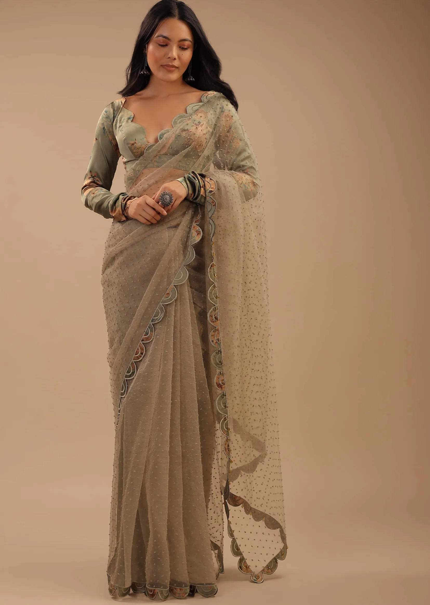 Tea Green Organza Saree With Self Buttis And A Floral Printed Satin Blouse