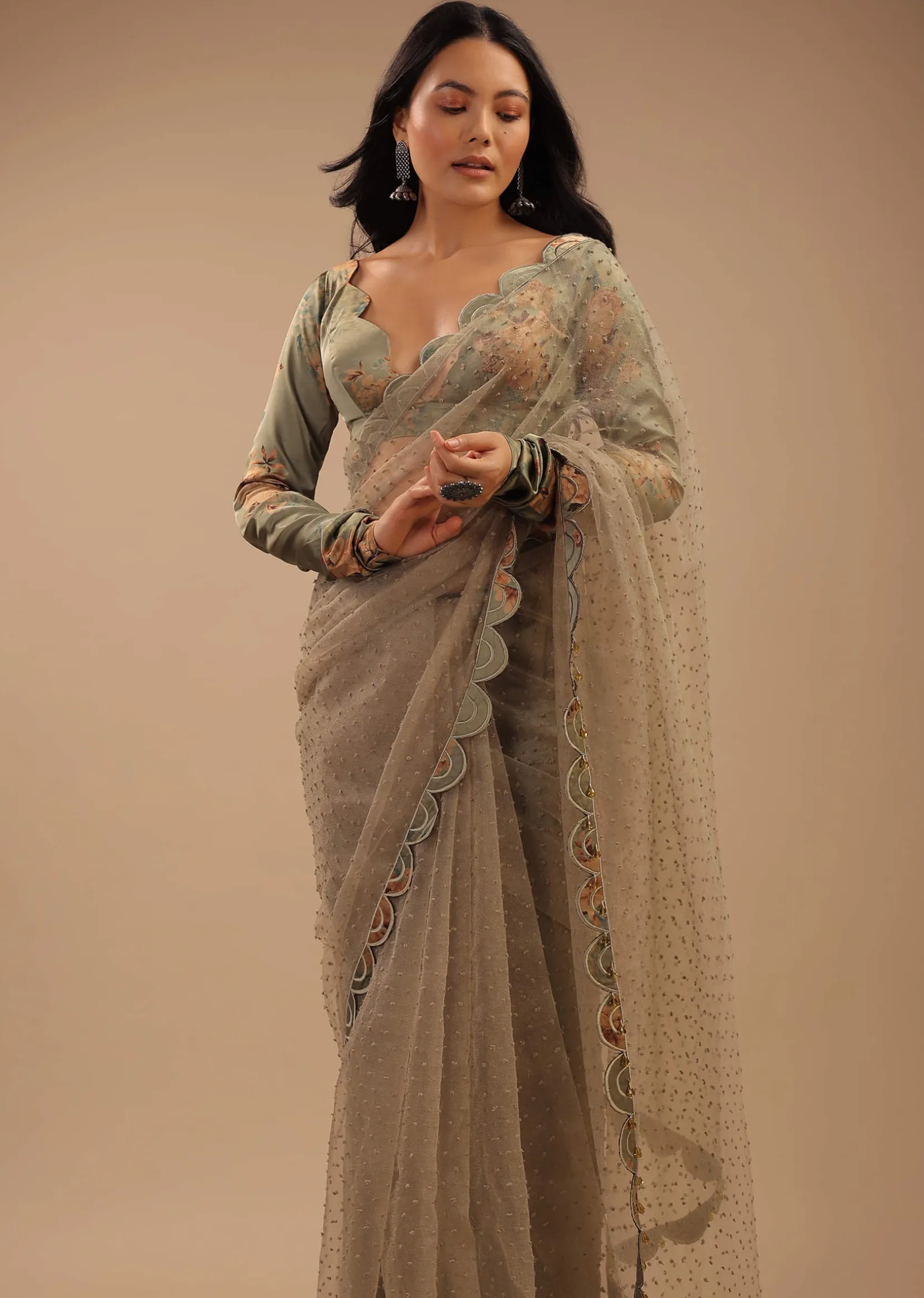 Tea Green Organza Saree With Self Buttis And A Floral Printed Satin Blouse