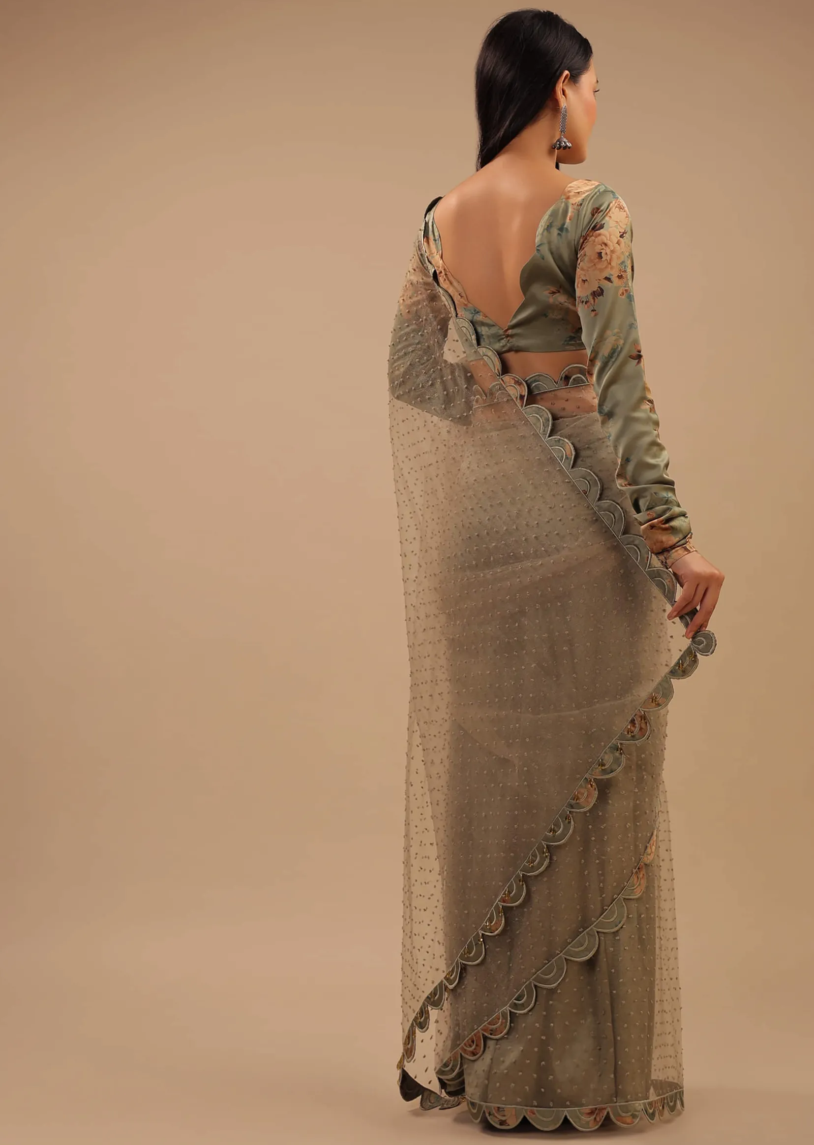 Tea Green Organza Saree With Self Buttis And A Floral Printed Satin Blouse