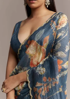 Teal Blue Tissue Saree With Floral Print And Embroidered Border