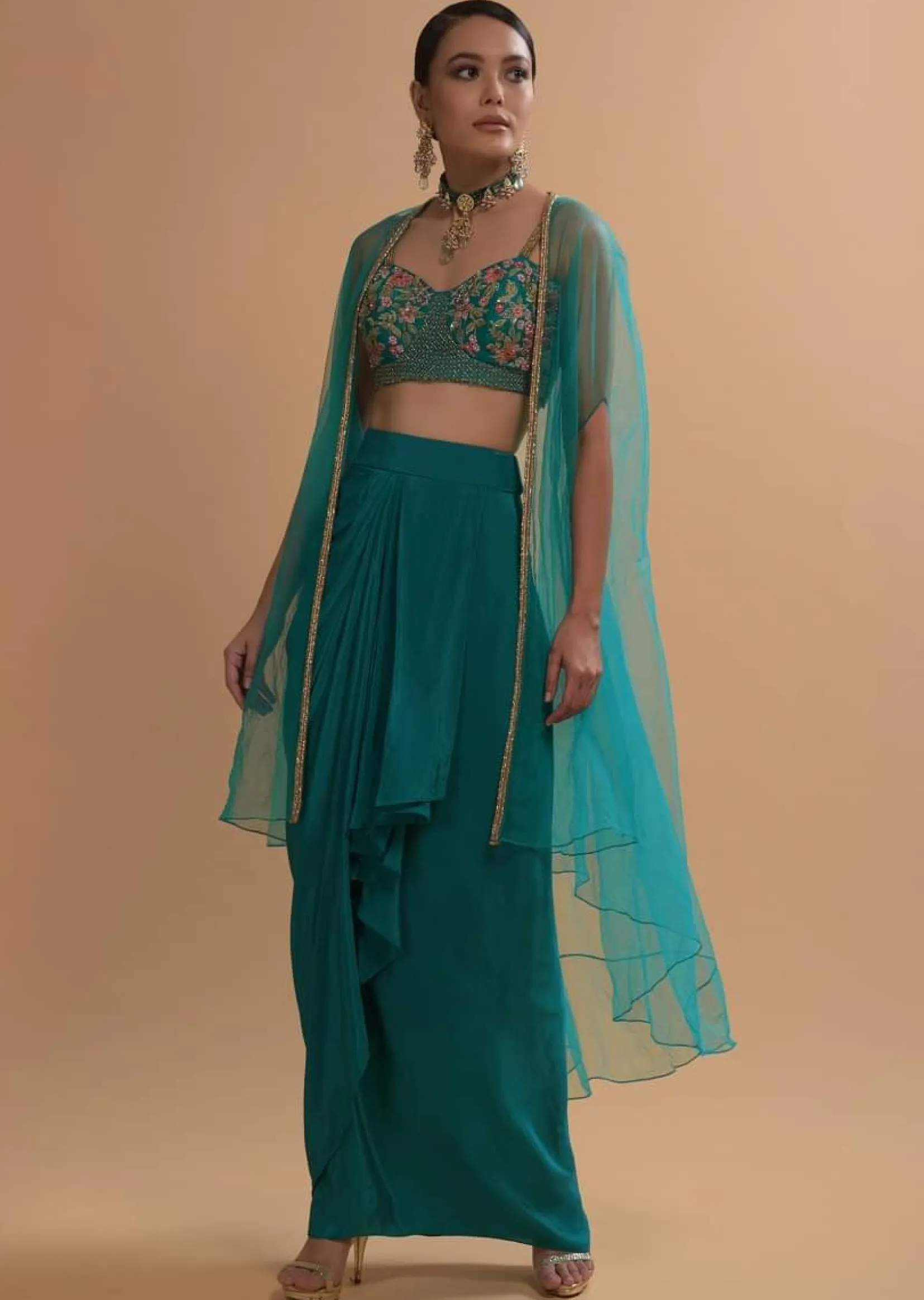 Teal Drape Skirt And Crop Top With Matching Cape And Colorful Resham Embroidered Spring Blooms