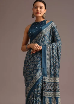 Teal Satin Ajrakh Print Saree With Mirror Embellished Border And Pallu