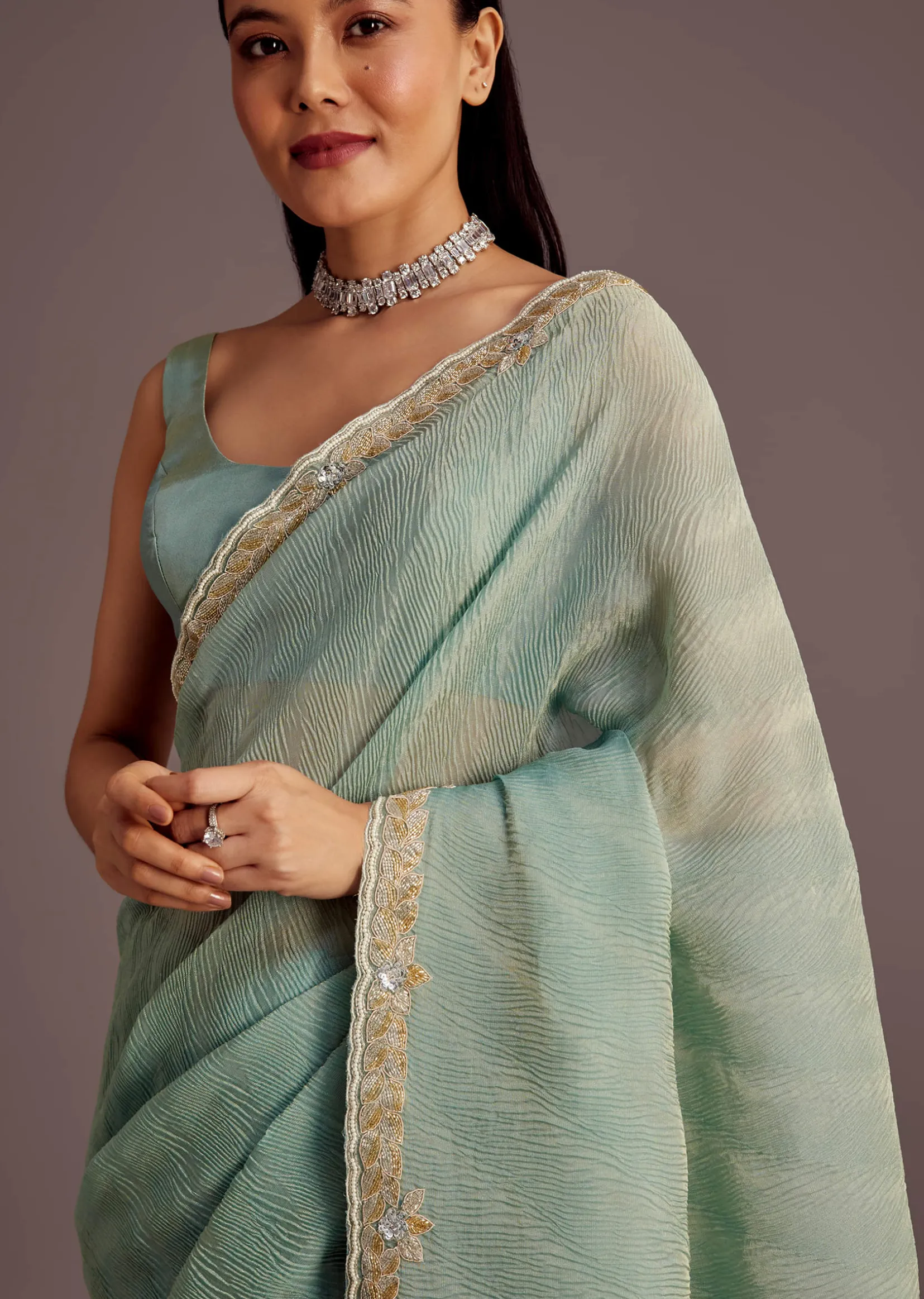 Turquoise Blue Crush Tissue Cutdana Work Saree With Embroidered Border