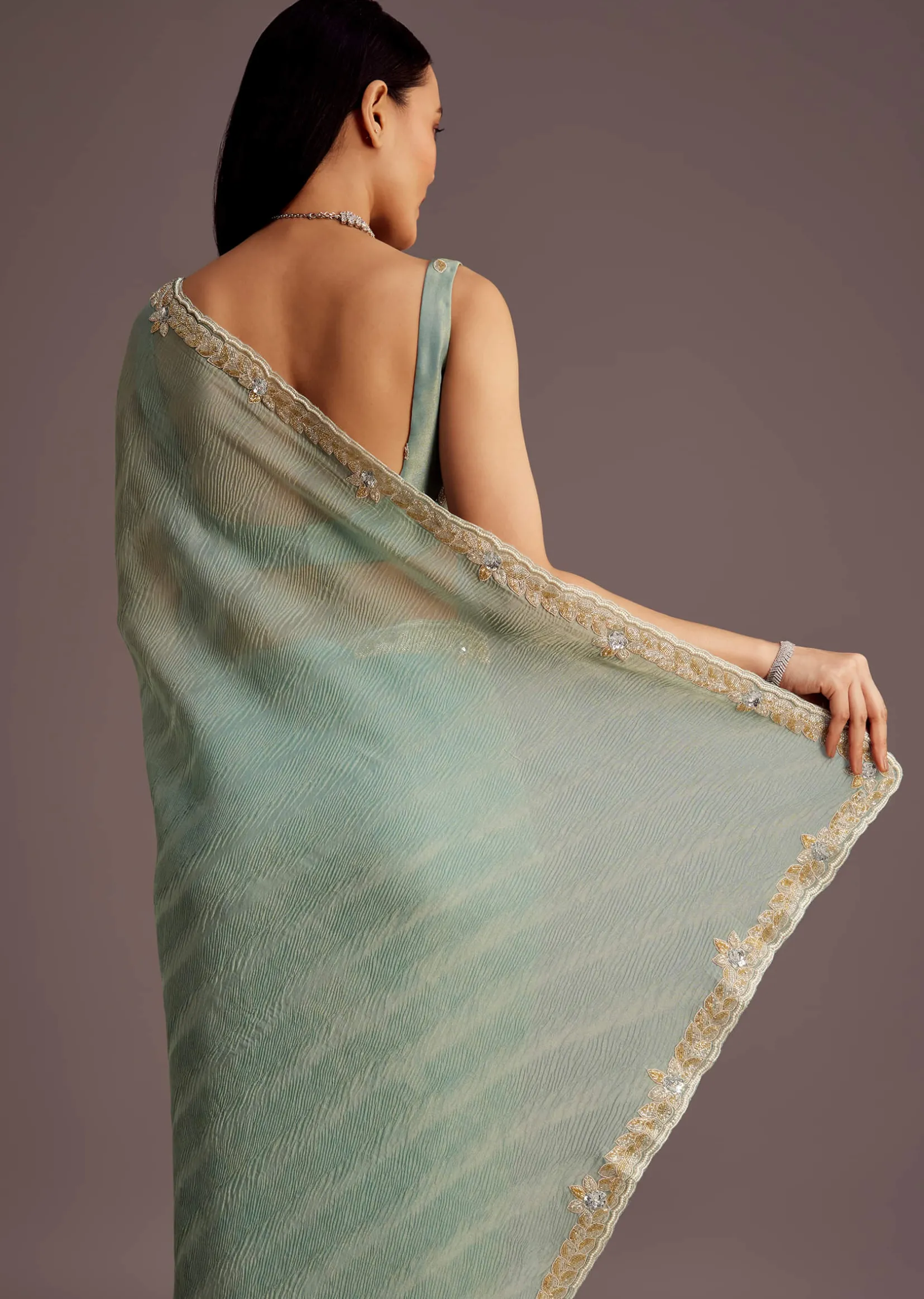 Turquoise Blue Crush Tissue Cutdana Work Saree With Embroidered Border