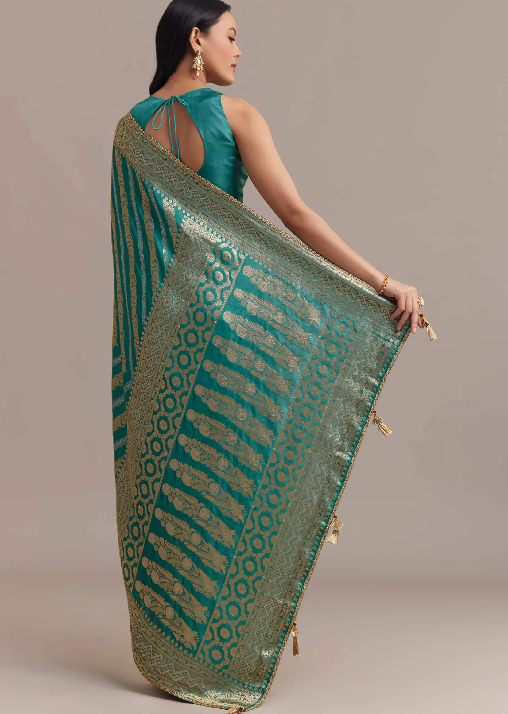 Turquoise Green Dola Silk Saree With Zari Weaving