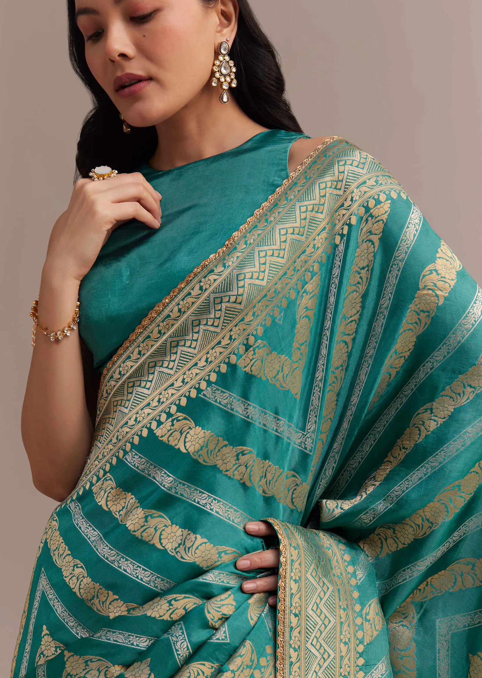 Turquoise Green Dola Silk Saree With Zari Weaving