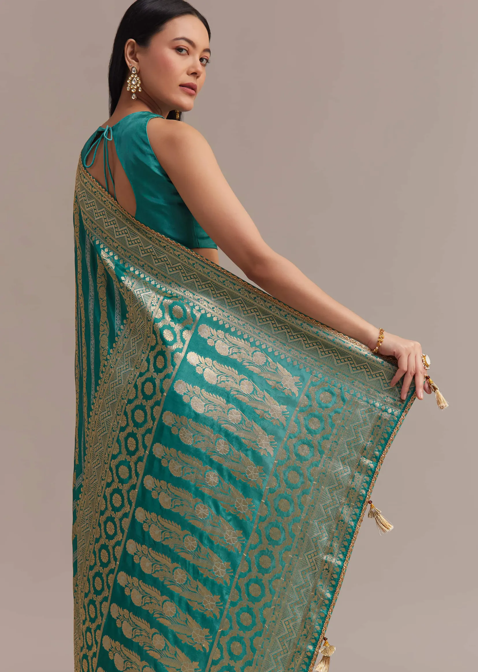 Turquoise Green Dola Silk Saree With Zari Weaving