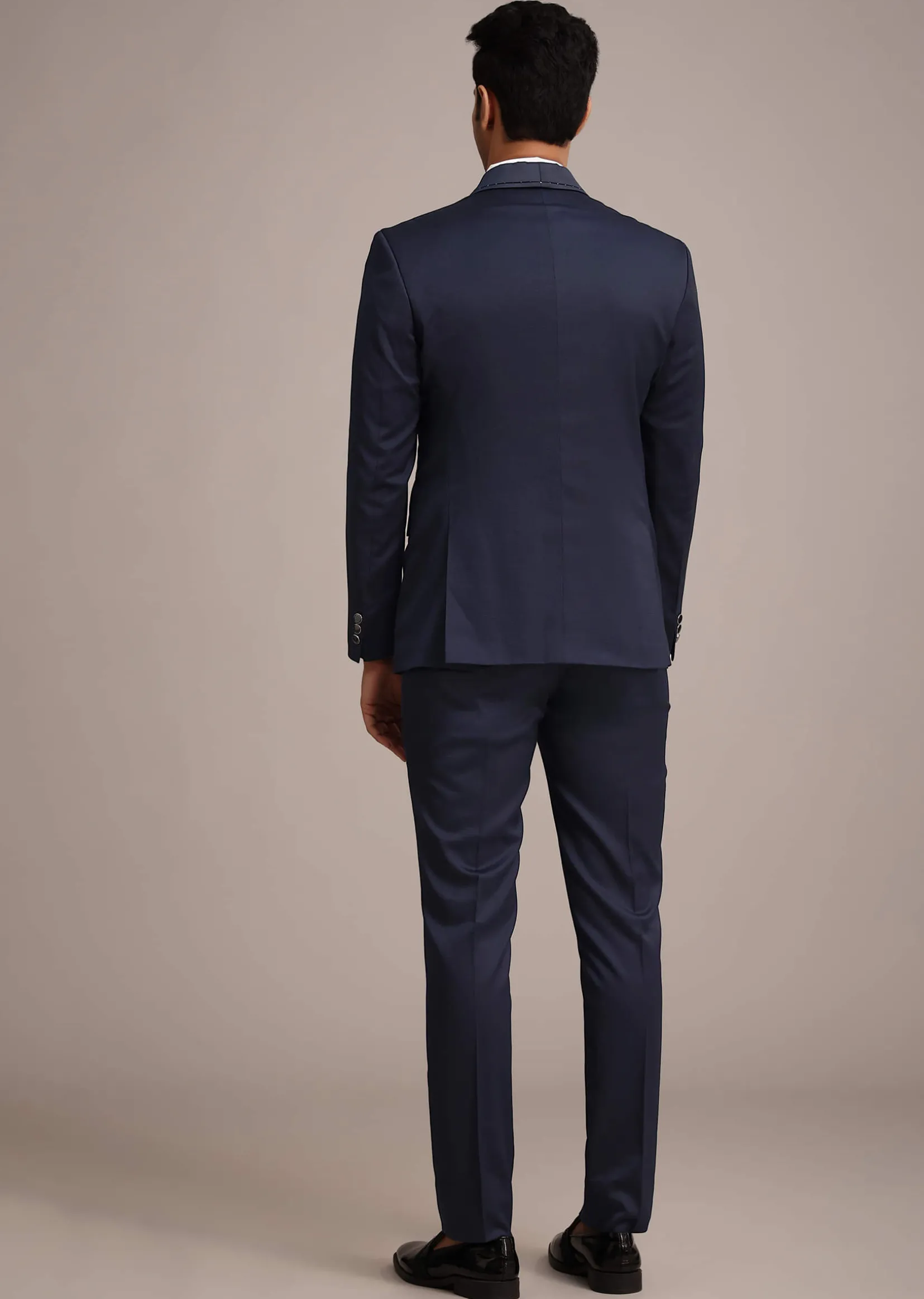 Tuxedo With Intricate Cut Work In Blue