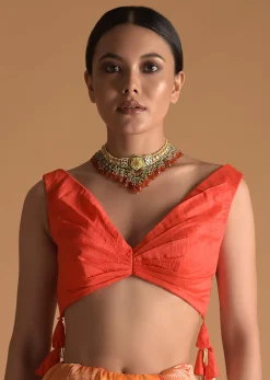 Vermillion Orange Blouse In Raw Silk With Pleat Details On The Front And Back Along With Tassels On The Sides