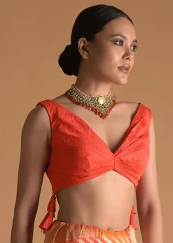 Vermillion Orange Blouse In Raw Silk With Pleat Details On The Front And Back Along With Tassels On The Sides