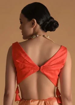 Vermillion Orange Blouse In Raw Silk With Pleat Details On The Front And Back Along With Tassels On The Sides