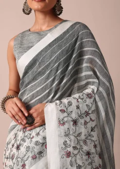 White Cotton Linen Floral Thread Embroidered Saree With Unstitched Blouse Piece
