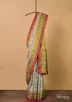 White Cotton Silk Saree With Ikat Patola Work And Unstitched Blouse Fabric