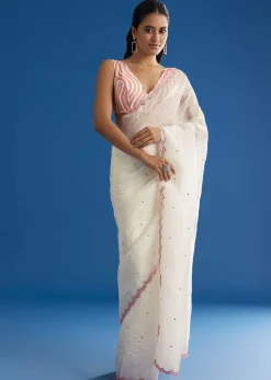 White Crepe Silk Saree With Mirror Scallop Border And Pink Contrast Blouse