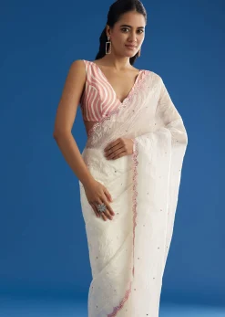 White Crepe Silk Saree With Mirror Scallop Border And Pink Contrast Blouse