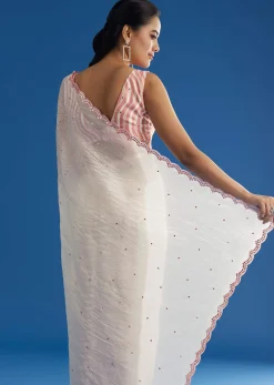 White Crepe Silk Saree With Mirror Scallop Border And Pink Contrast Blouse