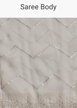 White Glass Tissue Saree With Sequins Embroidery And Scallop Border
