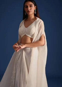 White Jacket With Embellished Blouse And Draped Skirt