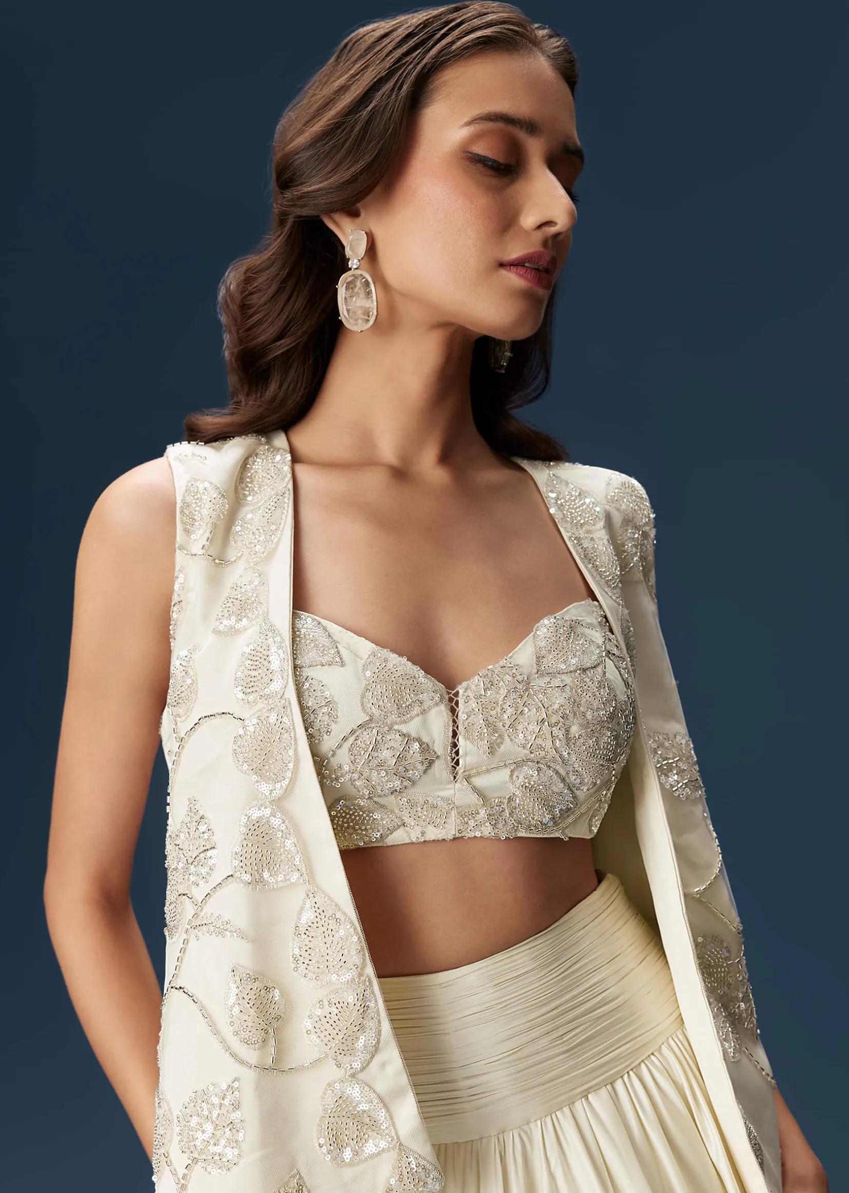 White Lehenga With Embroidered Jacket
