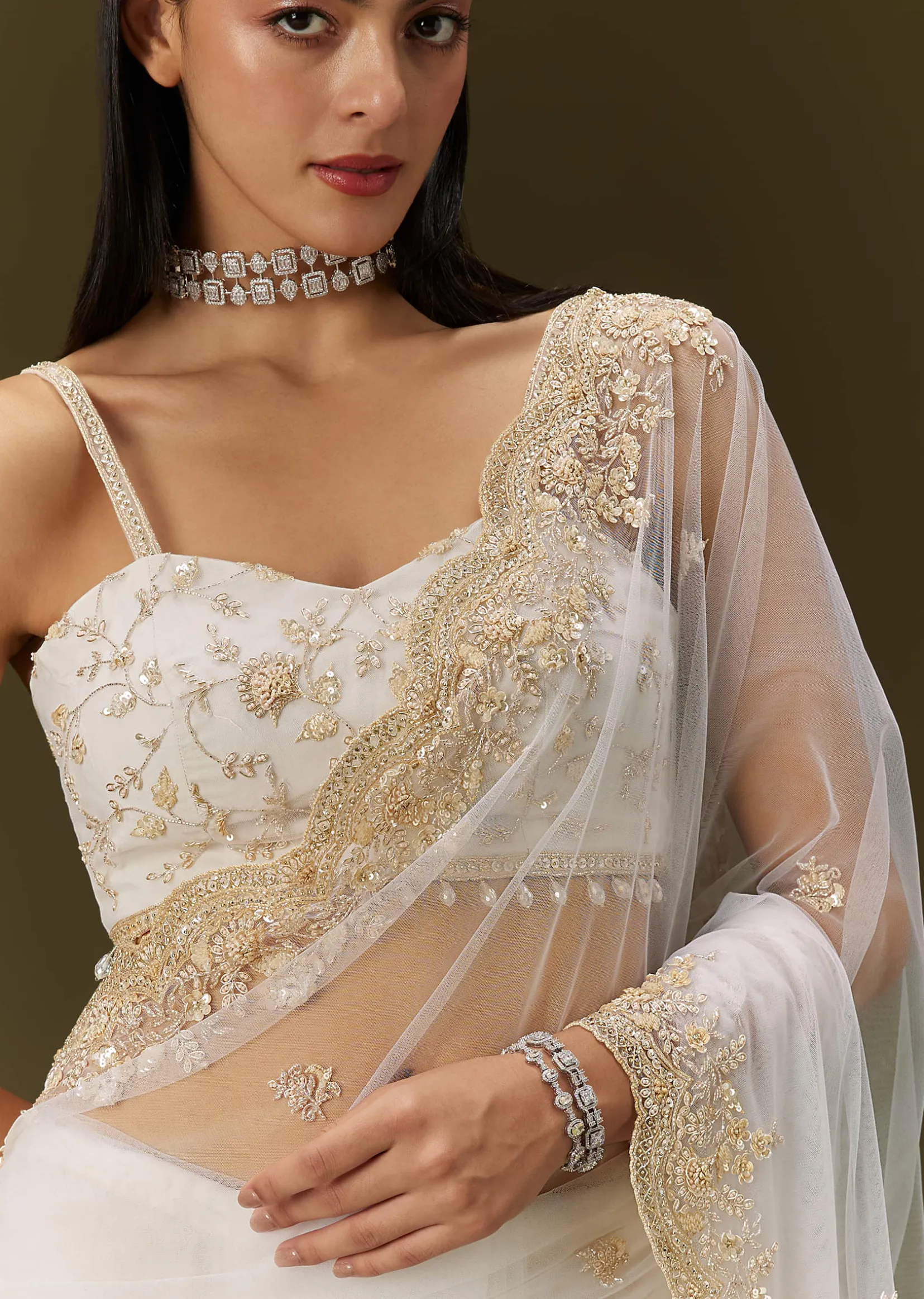 White Net Heavy Embroidered Saree With Embellished Border