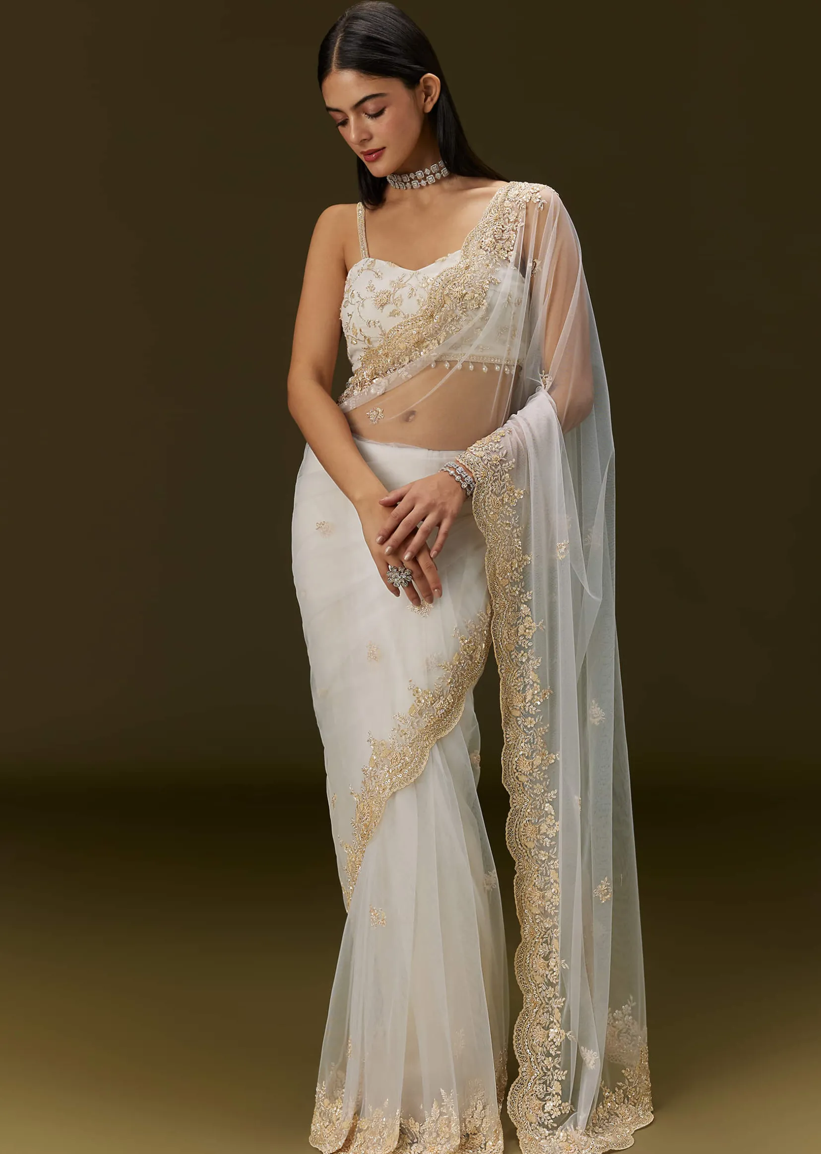 White Net Heavy Embroidered Saree With Embellished Border