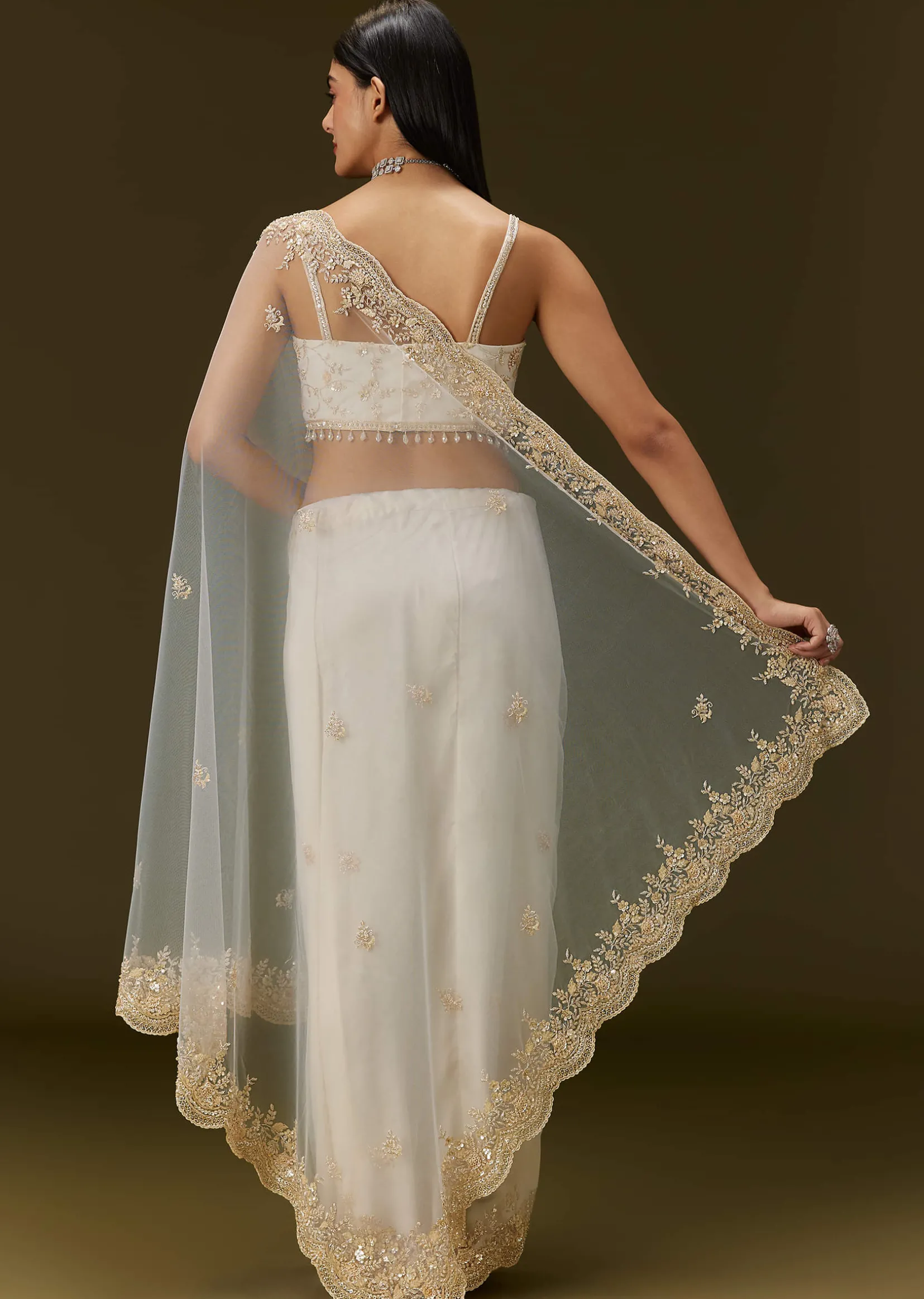 White Net Heavy Embroidered Saree With Embellished Border