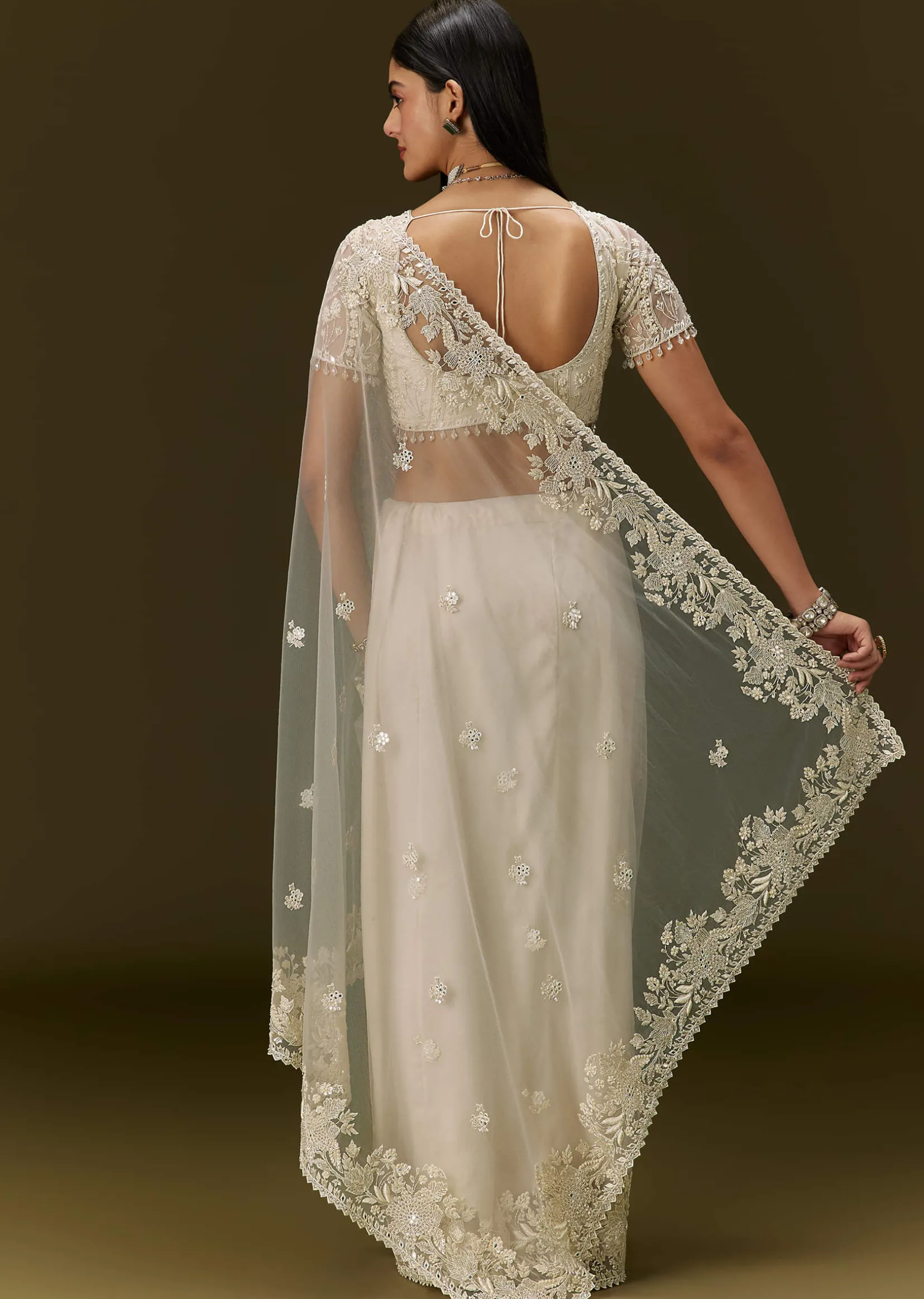 White Net Saree With All Over Heavy Embroidery