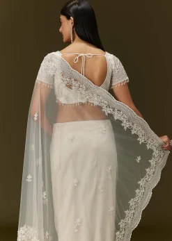 White Net Saree With All Over Embroidery